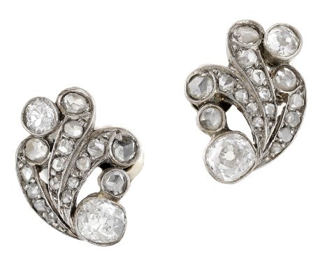 A pair of diamond spray earrings, converted from a 19th century jewel, of scroll design, set throughout with old brilliant an