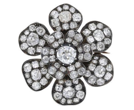 A mid 19th century diamond brooch, the flowerhead set throughout with cushion-shaped and old brilliant-cut diamonds, mounted 