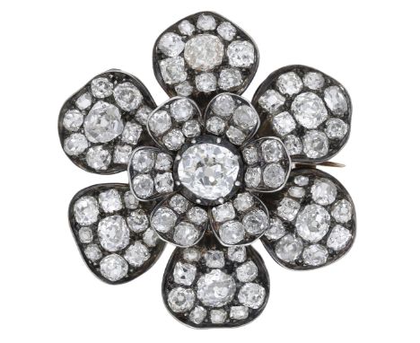 A mid 19th century diamond brooch, the flowerhead set throughout with cushion-shaped and old brilliant-cut diamonds, mounted 