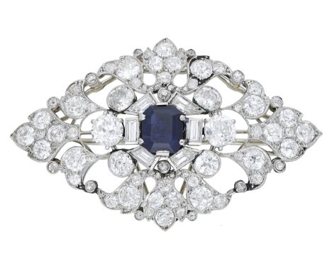 A sapphire and diamond brooch, circa 1930, the pierced lozenge-shaped brooch set throughout with old brilliant-cut and baguet