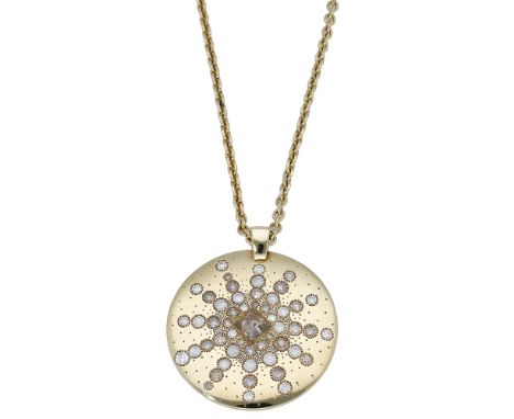 A diamond ‘Talisman' necklace by De Beers, the circular plaque set with a rough diamond crystal, the starburst surround with 