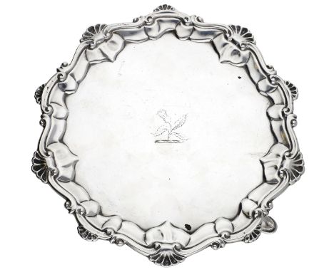 A George III silver waiter, with piecrust border incorporating scallops, crested, by maker ‘I C’ (probably John Cox), London 