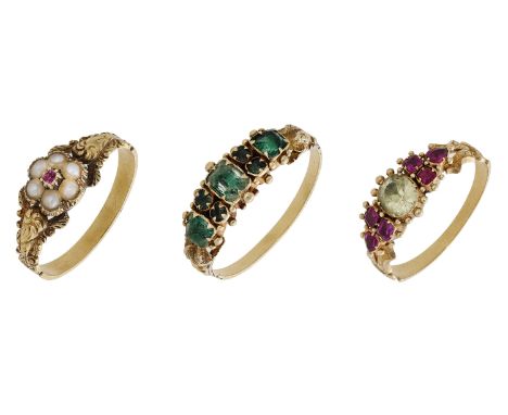 Three early 19th century gem-set rings, the first set with a seed pearl cluster, the second with graduated green stones, the 