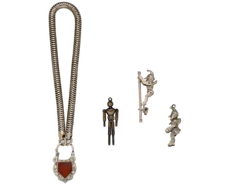 A mid to late 19th century bracelet and three charms, the snake-link bracelet to a carnelian set padlock clasp with engraved 