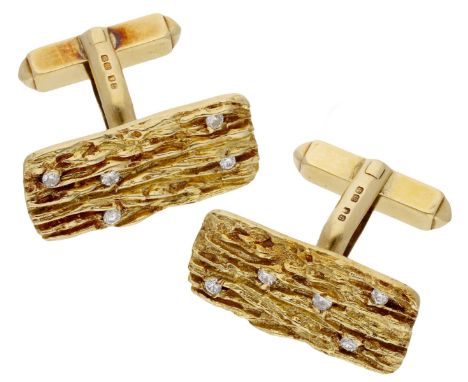 A pair of diamond cufflinks, 1968, each 18ct gold rectangular plaque with a textured bark finish and five brilliant-cut diamo