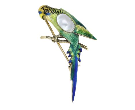A novelty budgerigar brooch, realistically modelled, the bird with polychrome enamel decoration throughout and centred with a