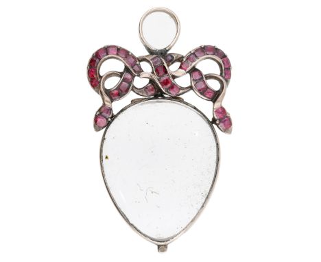 An early 19th century rock crystal locket pendant, the hinged pear-shaped locket formed of two rock crystal panels, beneath a