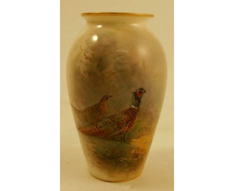 A Royal Worcester Vase, decorated with cock and hen pheasants in a glade by James Stinton, shape number G461, circa 1922, hei