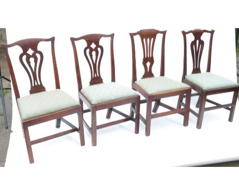 Four country Chippendale style dining chairs, with variations of vase splat back, drop-in seats and square legs