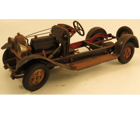 A 1929 Citroen C6 Chassis, constructional toy produced by Citroen Cars, includes steering wheel, radiator, and four rubber ty