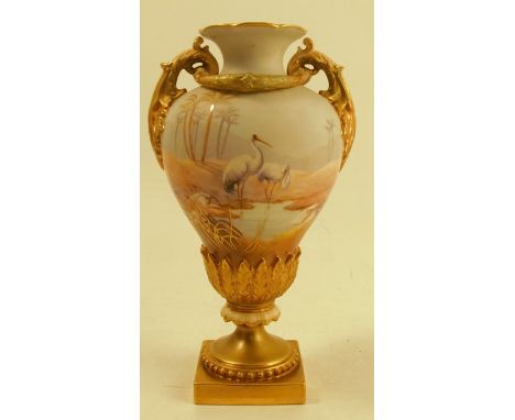 A Royal Worcester vase, decorated with storks in a desert oasis within an all around landscape to a powder blue ground, by Sh
