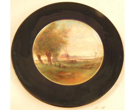 A Royal Worcester plate, decorated with a Corot scene and figures by Harry Davis, to a blue border, circa 1941, diameter 10.5