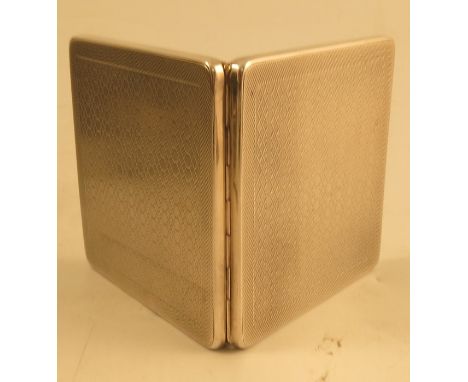A silver cigarette case, of square form with engine turned decoration, the gilt wash interior engraved MR with crown above, B