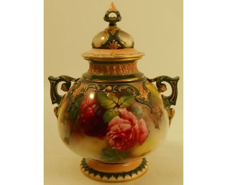 A Royal Worcester Hadley covered vase, decorated all around with roses by M Blake, with four small painted panels to the cove