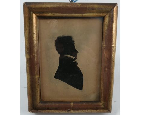 A 19th century framed silhouette portrait, of a man, 4.75ins x 3.75ins