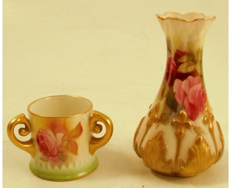 A Royal Worcester miniature three handled mug, decorated with roses by Millie Hunt, circa 1934, shape&nbsp; number H282, heig