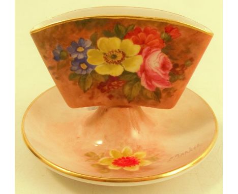 A Royal Worcester cigarette holder, decorated with flowers by Ernest Barker, circa 1940, height 3insCondition Report:  ok