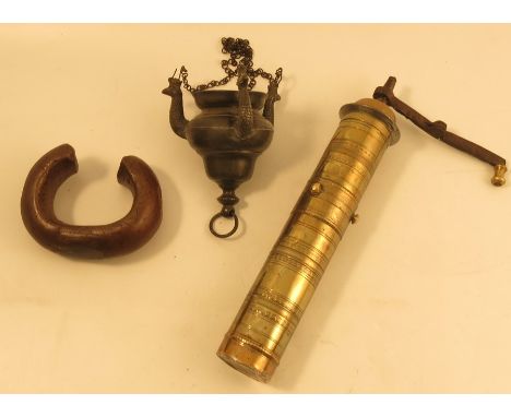 An antique Garanti Turkish brass coffee/pepper grinder, of cylindrical form with engraved decoration, with folding handle, he