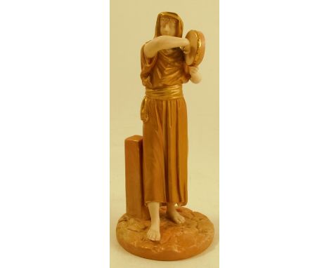 A Royal Worcester figure, of a girl playing a tambourine, shape number 1084, circa 1913, height 9insCondition Report:  Good c
