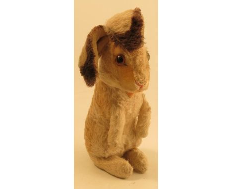 A Steiff plush rabbit, with button to ear, height 11ins