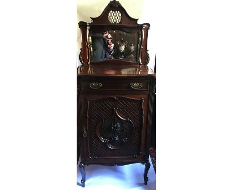 A late 19th century mahogany music cabinet, with mirrored shelf over, with drawer and carved cupboard below, height 59ins, wi