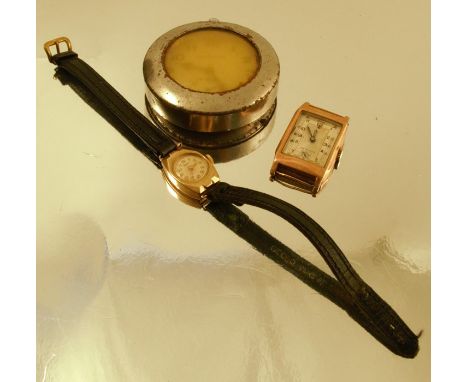 A gentleman's 9 carat gold mechanical wrist watch, head only, together with a lady's 9 carat gold mechanical wrist watch on a