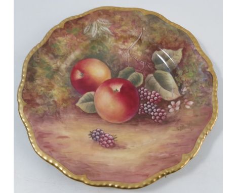 A Royal Worcester plate, decorated with fruit to a mossy background by J Skerrett, with gilt shaped edge, diameter 8insCondit