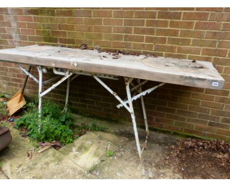 AN UNUSUAL PINE TOPPED METAL FRAMED TABLE