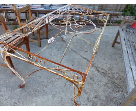 A WROUGHT IRON TABLE (NO TOP)