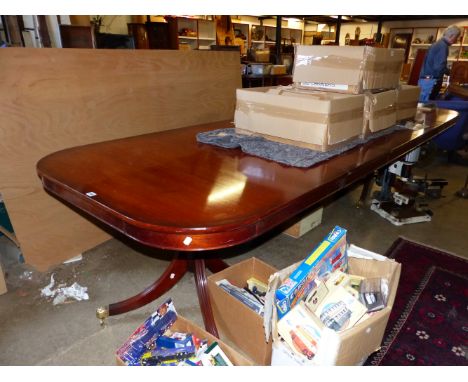 A LARGE GEORGIAN STYLE MAHOGANY TWIN PEDESTAL DINING TABLE