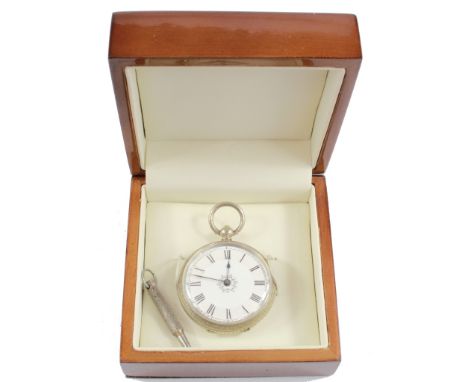 A lady's silver fob watch with a decorative white enamel dial complete with key