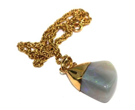 An opal pendant on 18 carat gold neck chain