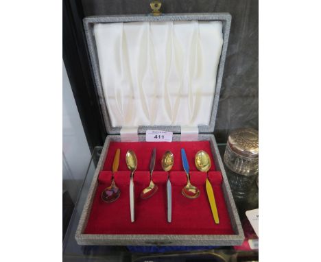 A cased set of six Norwegian silver and enamel coffee spoons