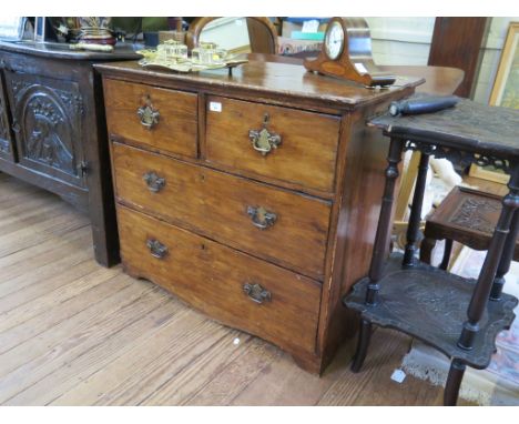 A varnished pine chest of drawers, with two short and two long drawers on bracket feet, 89cm wide