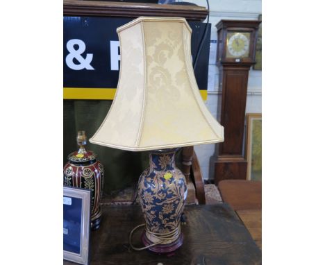 A pair of Dar lighting baluster vase table lights with acanthus decoration and another table light (3)