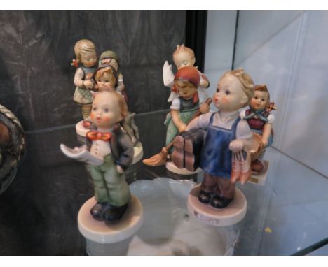 Seven Hummel figures of children all produced by W. Goebel (7) 12cm high