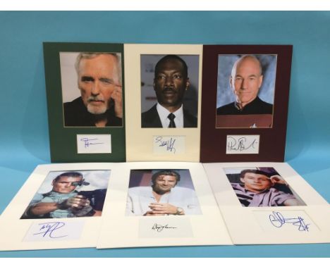 Assorted mounted photos and signed cards, to include Eddie Murphy, Dennis Hopper, Patrick Stewart, Christian Slater, Don John