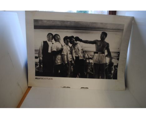 The Beatles / Mohammad Ali, a large b/w print 80cm x 60cm approx. of The Beatles and Mohammad Ali - some damage on the bottom