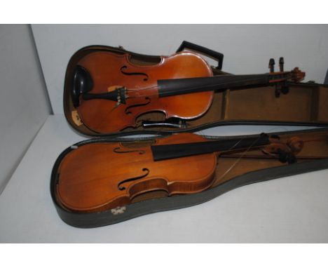 Violins, a pair of full sized violins in need of repair, missing various parts although both bodies in fairly good condition 