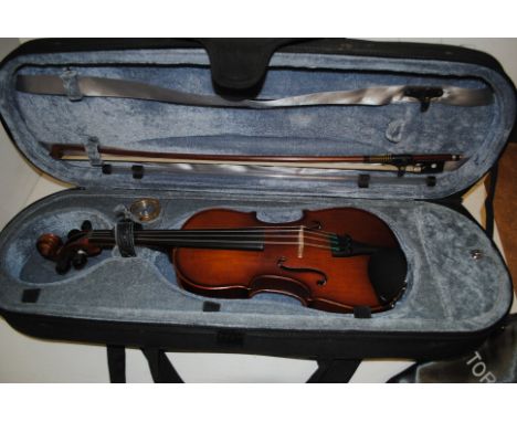 Violin, half size Stentor Graduate with bow and black case, good condition