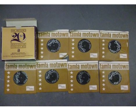Motown, 20th anniversary singles box vinyl in good condition, box shows wear, not including free single and enamel badge