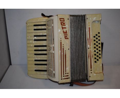 Accordion, Pietro made in Italy generally good condition but some damage to cloth in grille with hard case