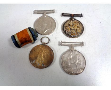 Four WW I medals - 49167 Pte E T Genders S. Staff. R.,  84755 GNR G.E. Cole, R.A., 84755 GNR G.E. Cole R.A, and 10655  Pte J 