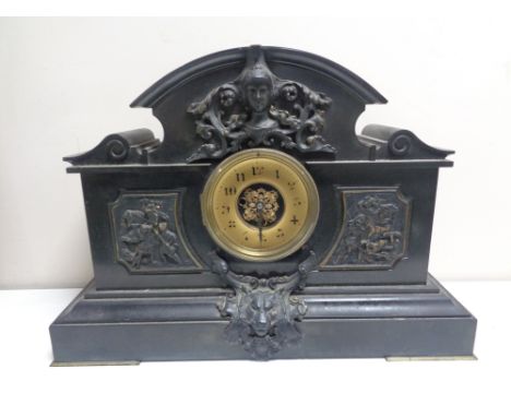 A Victorian slate mantel clock