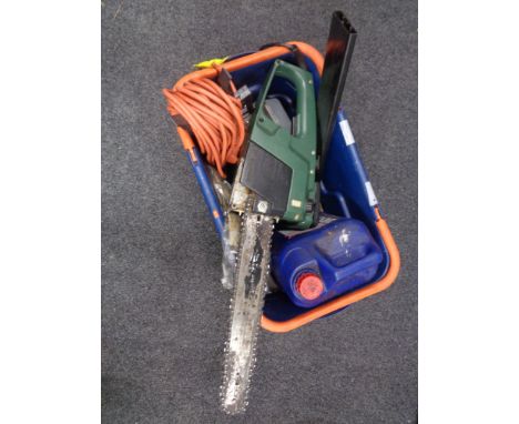 A box containing Black and Decker electric chain saw, extension lead etc.   