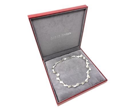 A Georg Jensen Sterling Silver Necklace, length 46 cm, in original retail box.  CONDITION REPORT: Minor surface scratches but