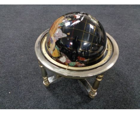 A Gemstone globe on stand, height 44 cm. 