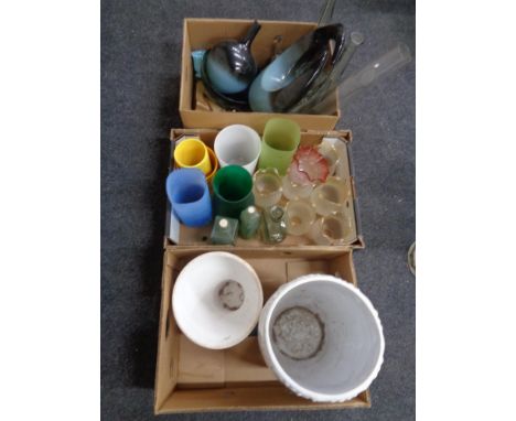 Three boxes containing etched and coloured glass, light shades, scent bottles, pottery vases etc 