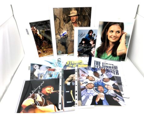A collection of signed photographs and ephemera to include - Strangeness in Space, Raintown, The Light of September, Brad Pai