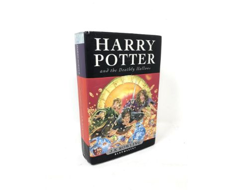 J.K. Rowling : Harry Potter and the Deathly Hallows, First Edition, 607 pages, hardcover with dust jacket, published by Bloom